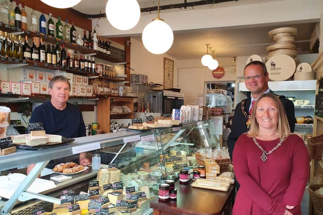 The Mayor and Mayoress with Paul Adams at The Cheese Shop in Eastgate.