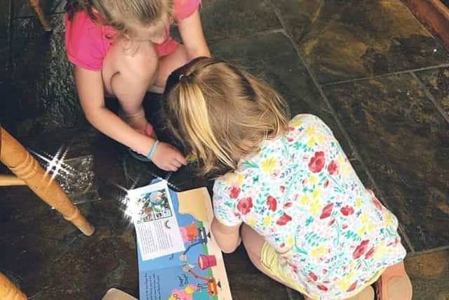 Tracy's daughters Imogen and Edith helping with the packs.