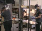 McDonald's staff will be working behind screens as part of safe social distancing in kitchens. EMN-200406-162513001
