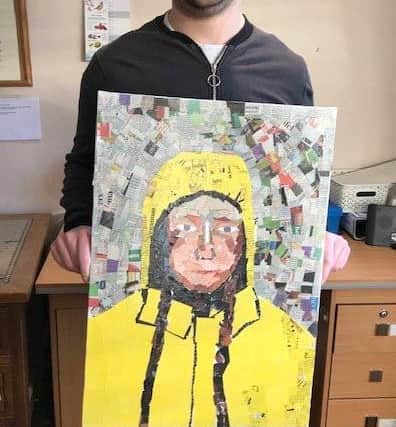 Charles Blake with one of his pictures