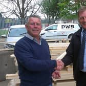 Mick Vines and DWB's Steve Pinner shake on the original deal in 2014.