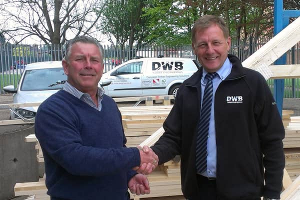 Mick Vines and DWB's Steve Pinner shake on the original deal in 2014.