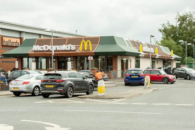 McDonalds reopened in Boston and staff helped guide the queues of customers waiting for their burger fix in on the first day
