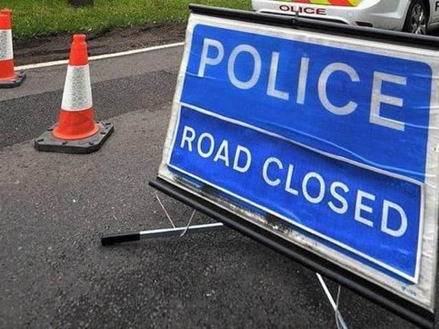 Road closed due to a collision.
