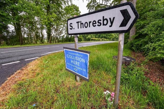 Flowers were left near the police collision sign, on the A16 at Calceby. EMN-201006-155035001