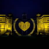 Doddington Hall in Lincoln lit up yellow to celebrate. EMN-201106-094034001