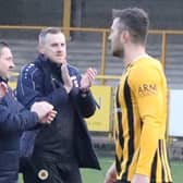 Craig Elliott with assistant John McDermott and goalkeeping coach Rich Lawrence. Photo: Eric Brown.