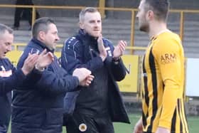 Craig Elliott with assistant John McDermott and goalkeeping coach Rich Lawrence. Photo: Eric Brown.