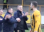 Craig Elliott with assistant John McDermott and goalkeeping coach Rich Lawrence. Photo: Eric Brown.