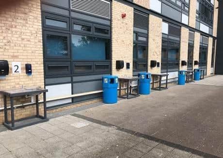 Outdoor sinks at the entrance to St George's Academy. EMN-200615-172057001