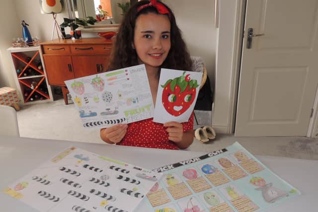 Winner takes all - Evie Sanger-Davies with designs for Fruit Frenzy. EMN-200619-173907001