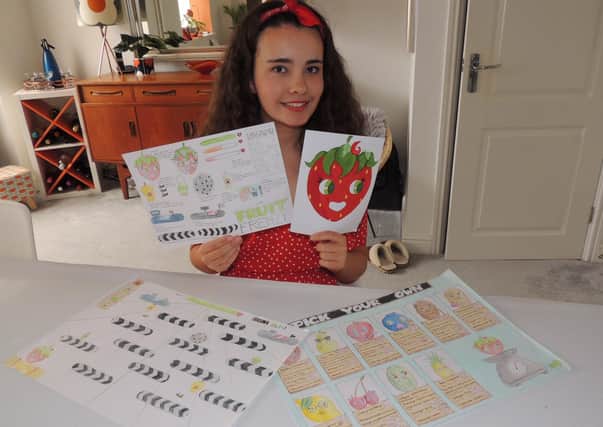 Winner takes all - Evie Sanger-Davies with designs for Fruit Frenzy. EMN-200619-173907001
