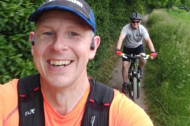 Nigel Johnson on his TriJOGLE with support Dean Marratty. EMN-200622-194156001