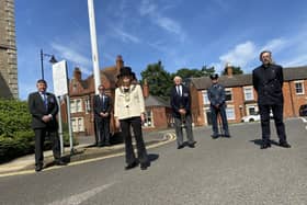 Leader of NKDC Richard Wright, chairman Susan Waring and representatives of the Armed Forces attended the flag raising ceremony for Armed Forces Week in Sleaford. EMN-200622-141230001