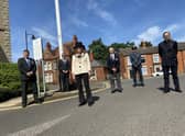 Leader of NKDC Richard Wright, chairman Susan Waring and representatives of the Armed Forces attended the flag raising ceremony for Armed Forces Week in Sleaford. EMN-200622-141230001