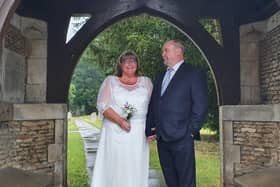 Sharon and Dave recreate their wedding day photos at Paston CHurch. EMN-200619-095237001