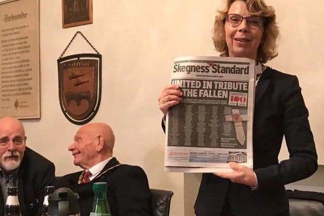 Mayor of Bad Gandersheim Franziska Schwartz with a copy of the Skegness Standard celebrating the 100th anniversary of the end of WW1 and the names of the brave featured on The Box of 2017. A copy is now part of an exhibition in the Bad Gandersheim museum.