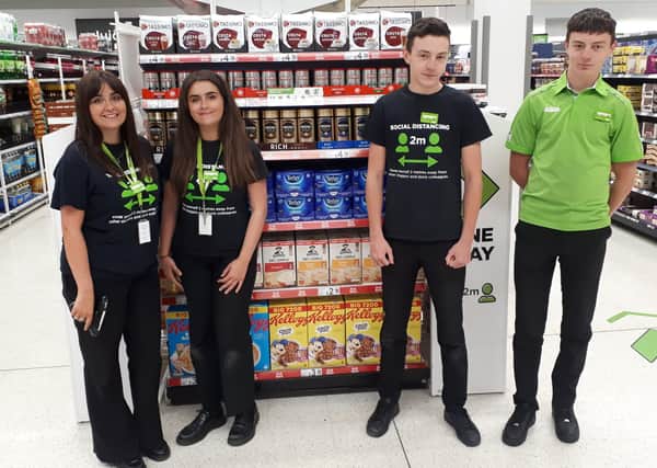What a co-twin-cidence! Lauren (left) and Charlotte Whisker and Jay (left) and Callum Troop, all of Asda, in Boston.