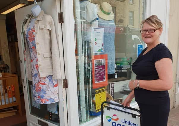 Shop manager Diane Cresswell is delighted to be open again