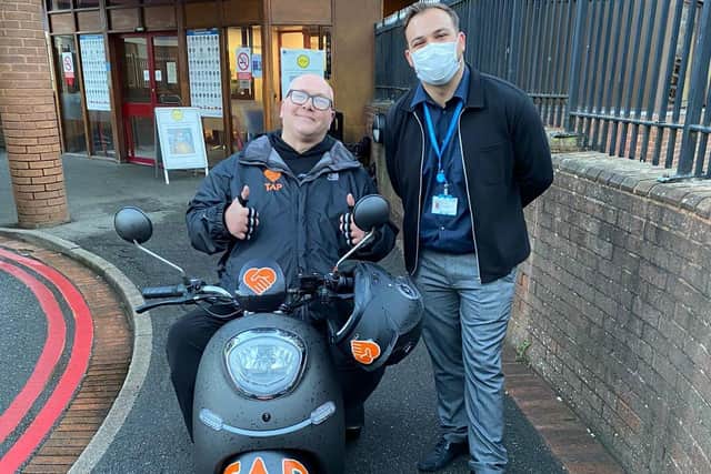 Simon meeting a NHS worker at Lincoln County Hospital.
