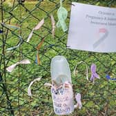 Some of the ribbons attached to the fence at Hubbard's Hills, Louth, to mark Baby Loss Awareness Week.