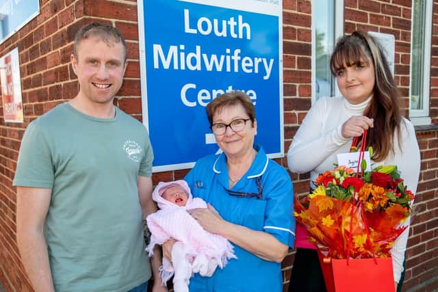 Adrian Collins-Anderson, Midwife Angela Chapman with Mollie-Ann, and Joanne Collins-Anderson.