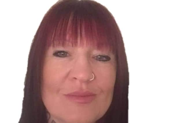 Celebrating her all clear - Michelle Morris of Sleaford. EMN-211014-173233001