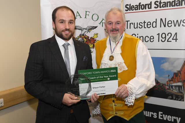 Shaun Fisher won Sports Coach of the Year, sponsored by Sleaford Town Council and presented by Town Crier and compere John Griffiths. EMN-211015-095400001