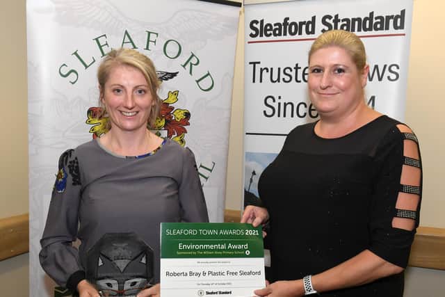 Roberta Bray (left) of Plastic Free Sleaford wins the Environmental Award presented by sponsors William Alvey School. EMN-211015-095454001
