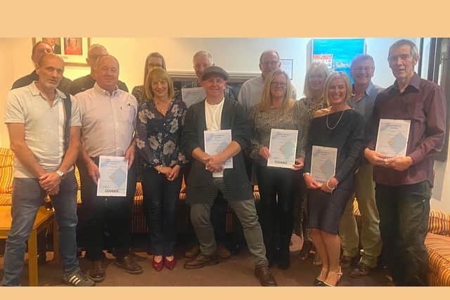 The long-service awards were handed out to Coveris Louth employees.