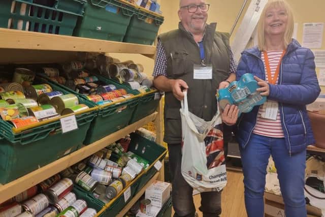 Storehouse food bank manager Steve Harris and volunteer Sue Hinkling.