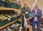 Storehouse food bank manager Steve Harris and volunteer Sue Hinkling.