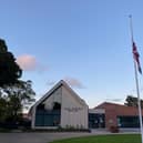 The Union Flag flying half-mast on Skegness' new flag pole in Tower Gardens.