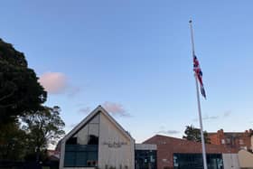 The Union Flag flying half-mast on Skegness' new flag pole in Tower Gardens.