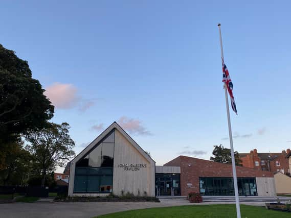 The Union Flag flying half-mast on Skegness' new flag pole in Tower Gardens.