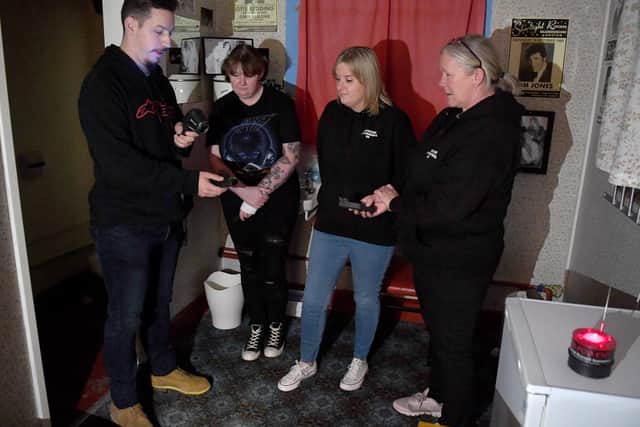 Members of Breaking Paranormal UK - from left Ashley Llewellyn, Tracy Ashburn, Kinberley Reynolds and Amanda Kershaw - invite spirits to make contact in the dressing room once used by pop legends of the 60's and 70's.
