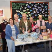 Filling shoe boxes at All Saints Church in Wragby. Photo John Edwards EMN-211018-104819001