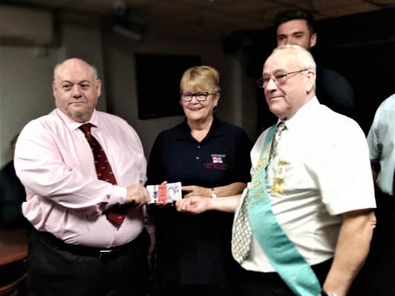 Presentation by the RAOB (Buffs) to the Skegness RNLI. Pictured (left to right) are Bro Scott Brazier KOM, Mairie Perry and Bro Steve Lines ROH.