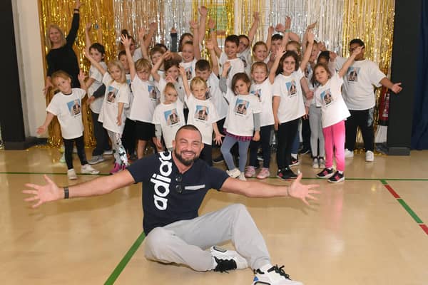 Former Strictly Come Dancing star, Robin Windsor at Church Lane School EMN-211020-123303001