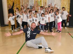 Former Strictly Come Dancing star, Robin Windsor at Church Lane School EMN-211020-123303001