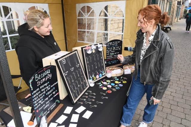 L-R Jess Cooper of Bespoke Stamping, with one of the organisers Harriet Wells of Millstream Square. EMN-211018-103258001