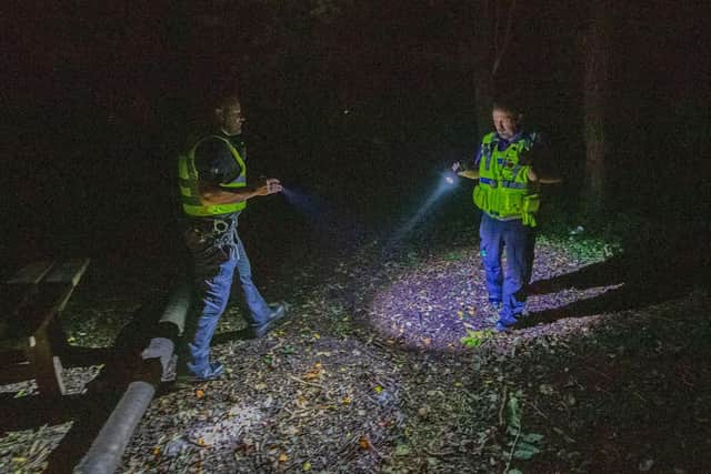 The team checking a wooden area in Spilsby. EMN-211021-110101001