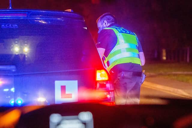 PC Green pulls over a driver for having illegal lights on his car. EMN-211021-111514001