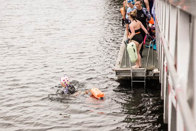 And she’s off! Amanda swims out for her final leg of the swim challenge. Photos by Leanne Donohue Photography