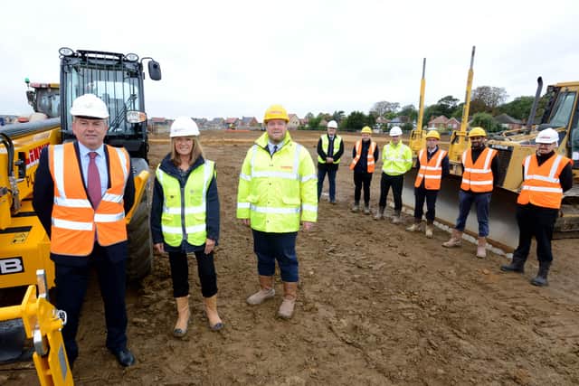 At front, from Coun Richard Wright, Leader of North Kesteven District Council, Nick Worboys, Director of Growth, Development and Sales at Longhurst Group and Freddie Chambers, Lindum Group Managing Director. Pictured to the rear, from left - Stephen Priestley, Housing Strategy Manager at North Kesteven District Council, Richard Dobson, Site Manager at Lindum Group, Mark Jones, Senior New Business Manager at Longhurst Group, Gavin Parker, Contracts Manager at Lindum Group, Mitul Shah, Development Manager at Lindum Group and Robert Jays, Land and Planning Manager at Lindum Group. EMN-211021-113854001