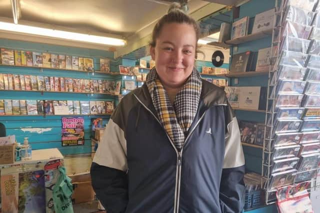 Lacy Haller, 25, kooks after a music shop for her partner's granddad, Neil Thompson.