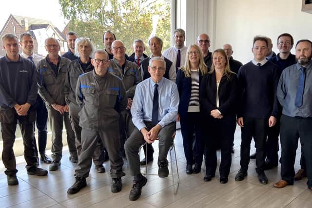 Peter Ashley with colleagues on his final day at work.