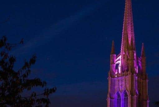 St James' Church lit up purple in previous years.