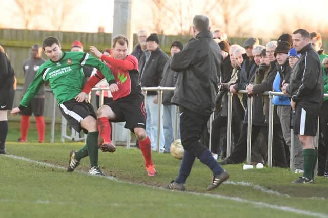 Harry Millard in action for the Greens.
