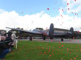 Petals dancing in the breeze after being released from the Just Jane Lancaster at the Lincolnshire Aviation Centre in East Kirkby.